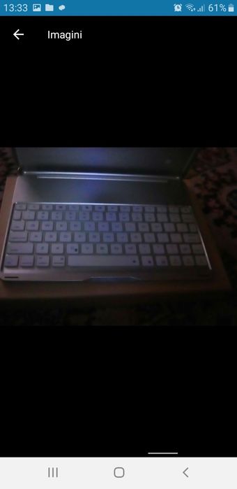 Carcasa tableta cu tastatura