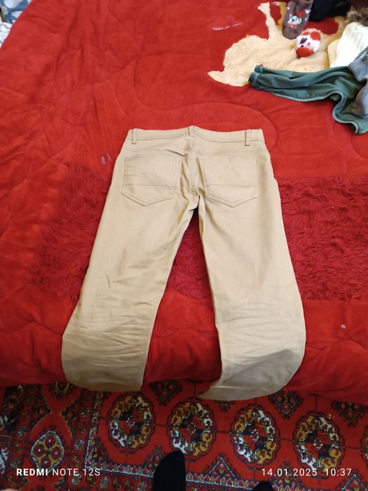 Джинсы коричневые