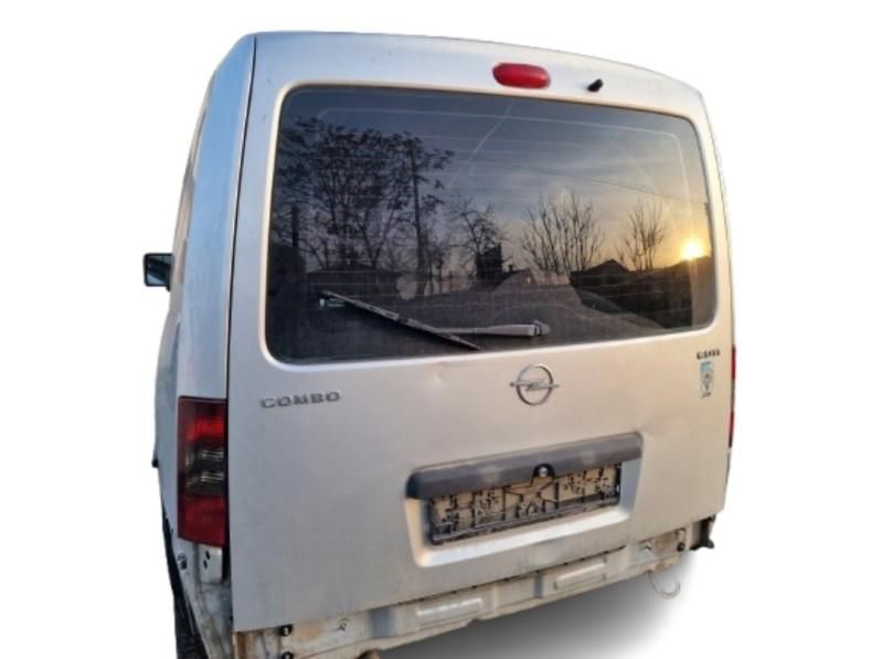 Fuzeta stanga fata 4x100 Opel Combo C 1.3 cdti 55 kw 75 cp Z13DTJ