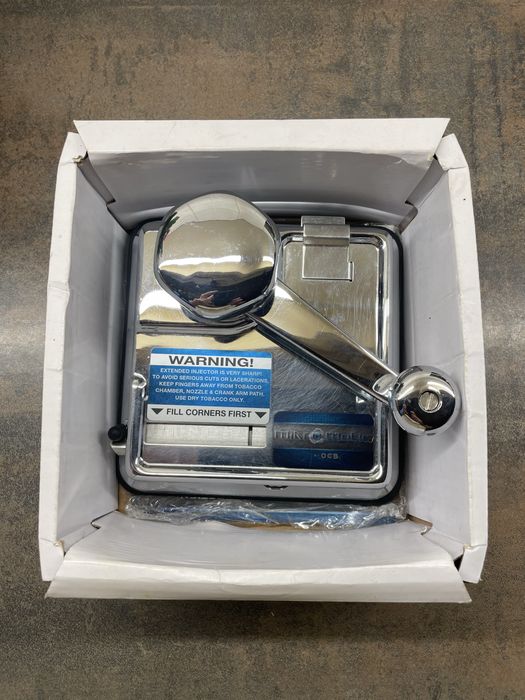 Aparat manual pentru facut tigari.