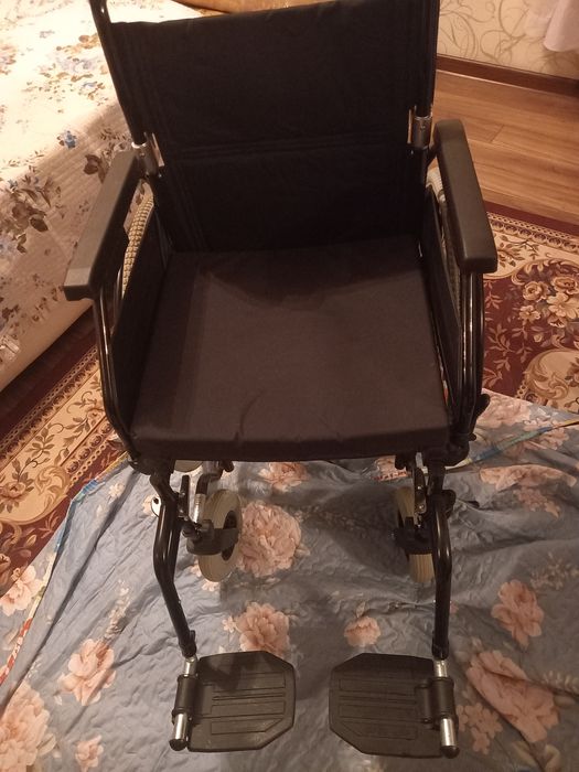 Прогулочная коляска для взрослых