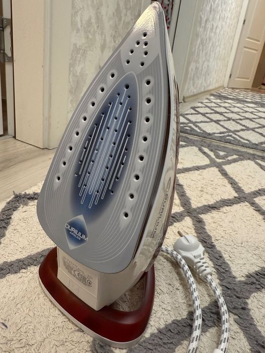 Ютия  Tefal Easygliss plus