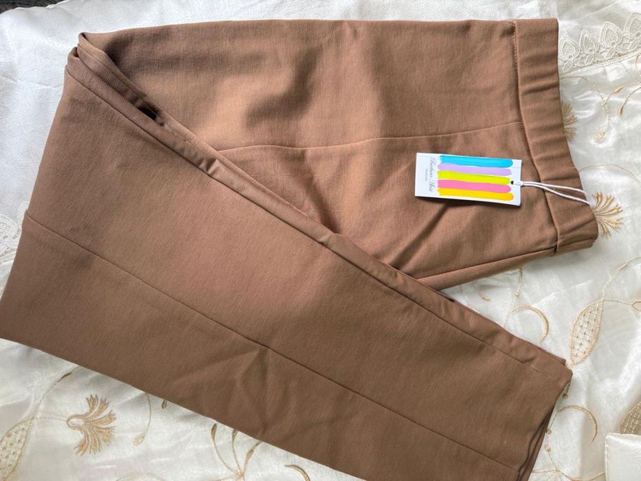 Брюки пройзводство Италия