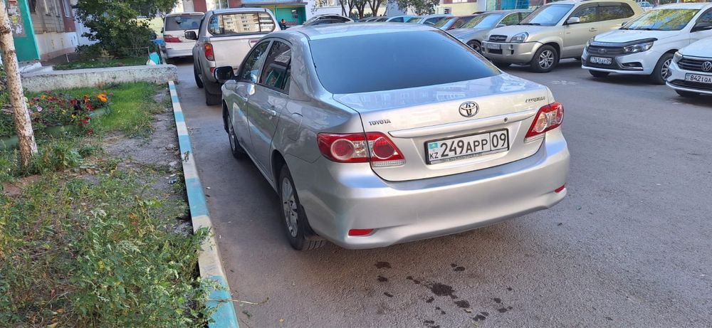 Тайота каролла серого цвета