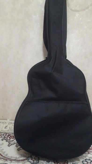 Yangi gitara biron marta ishlatilmagan kelishamiz