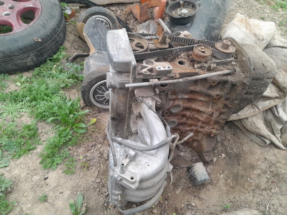 Двигатель карина е 1.6