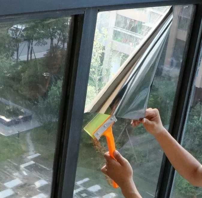 Folie de protectie solara cu efect tip oglinda pentru geamuri cladiri!
