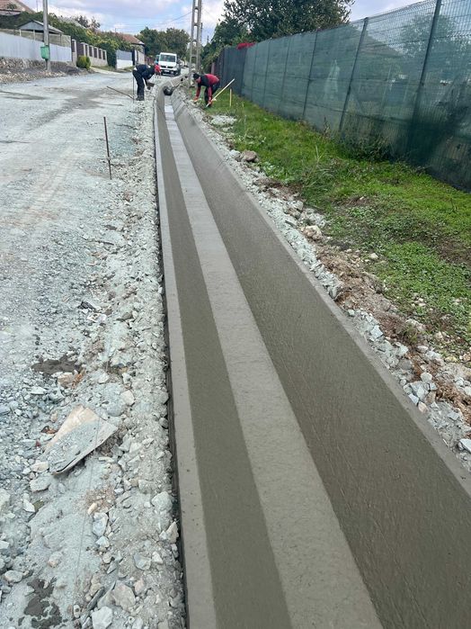 Santuri si rigole betonate  rigole de acostament realizate mecanizat