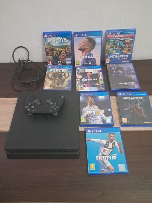 PlayStation 4 Slim + 9 jocuri – 670 lei