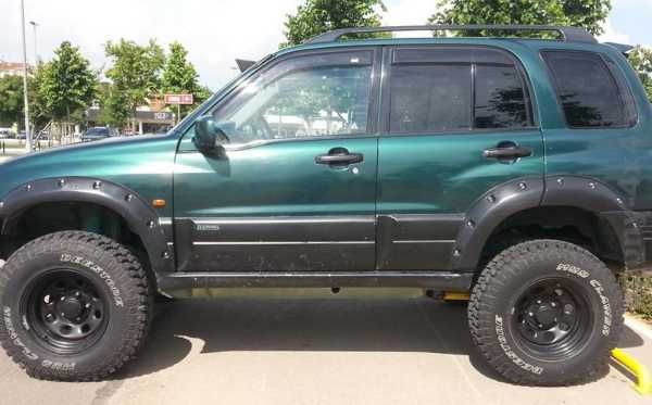 OVERFENDERE Suzuki GRAND Vitara 5 usi - 8 cm + kit garnituri/suruburi