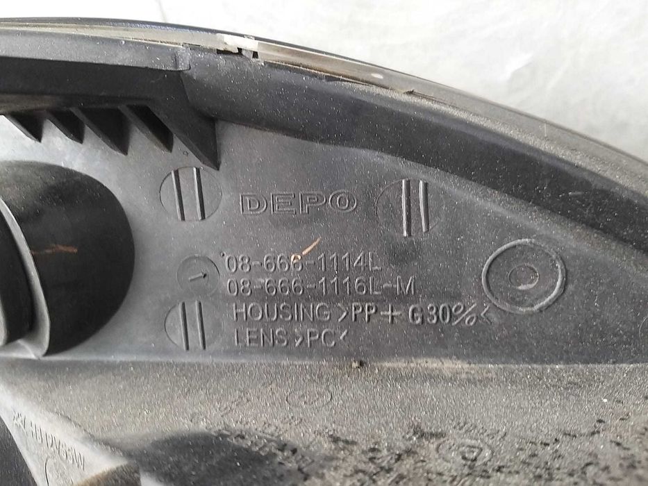 Far stanga lancia ypsilon 843 086661114l
