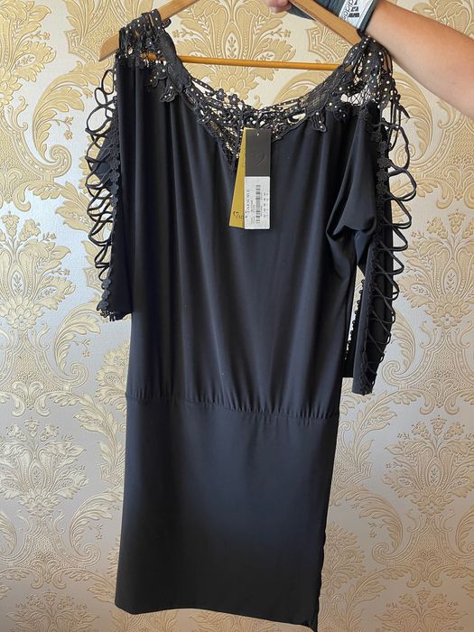 Женская/мужская одежда