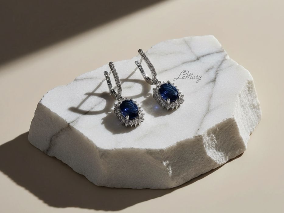 Изящные золотые серьги с бриллиантами и Сапфирами