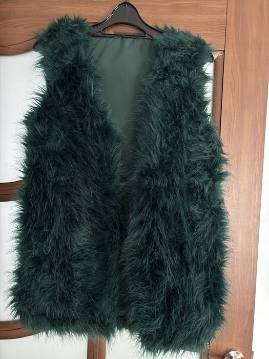 Vesta de blana.