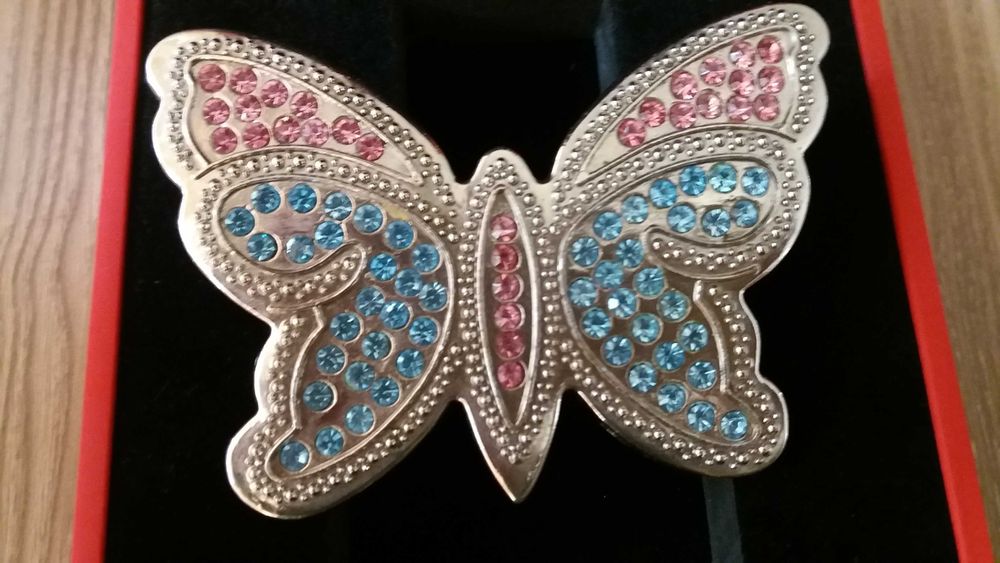 тока за колан пеперудата