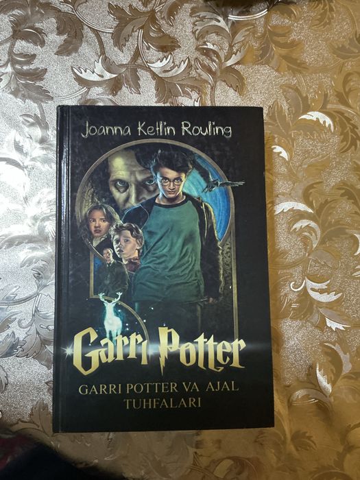 J.K Rowling Garri Potter va ajal tuhfalari