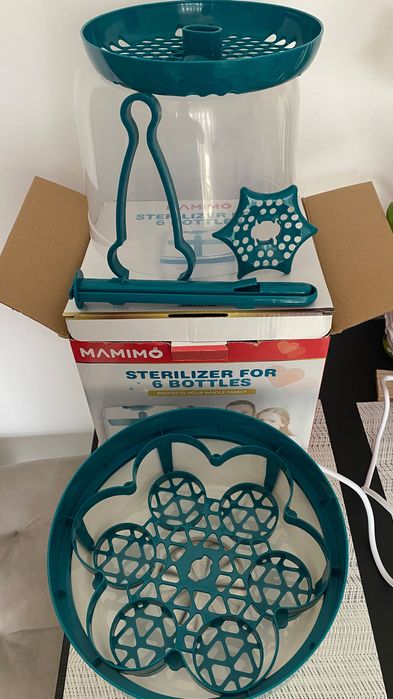 Sterilizatorul electric pentru 6 biberoane Mamimo