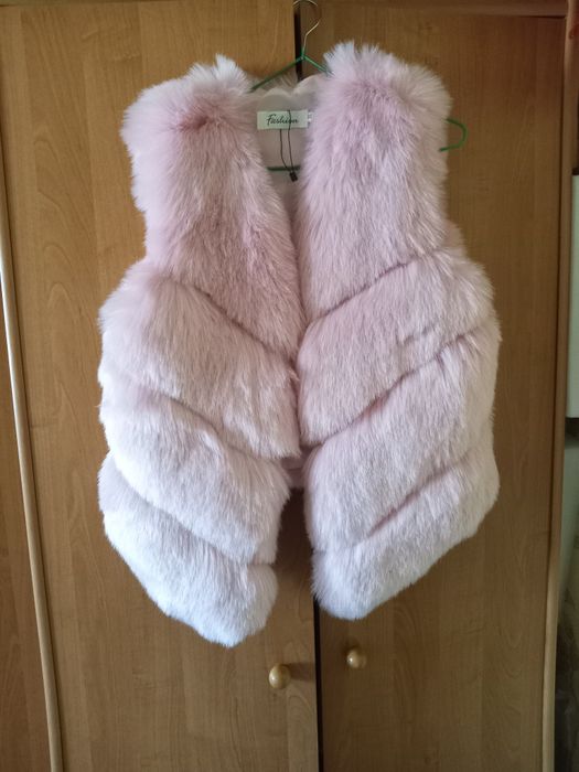 Жилетка новая  .