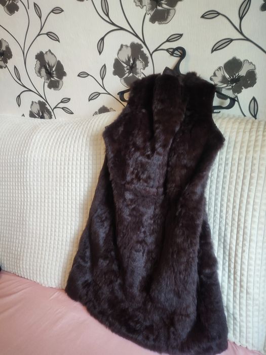 Меховая жилетка женская