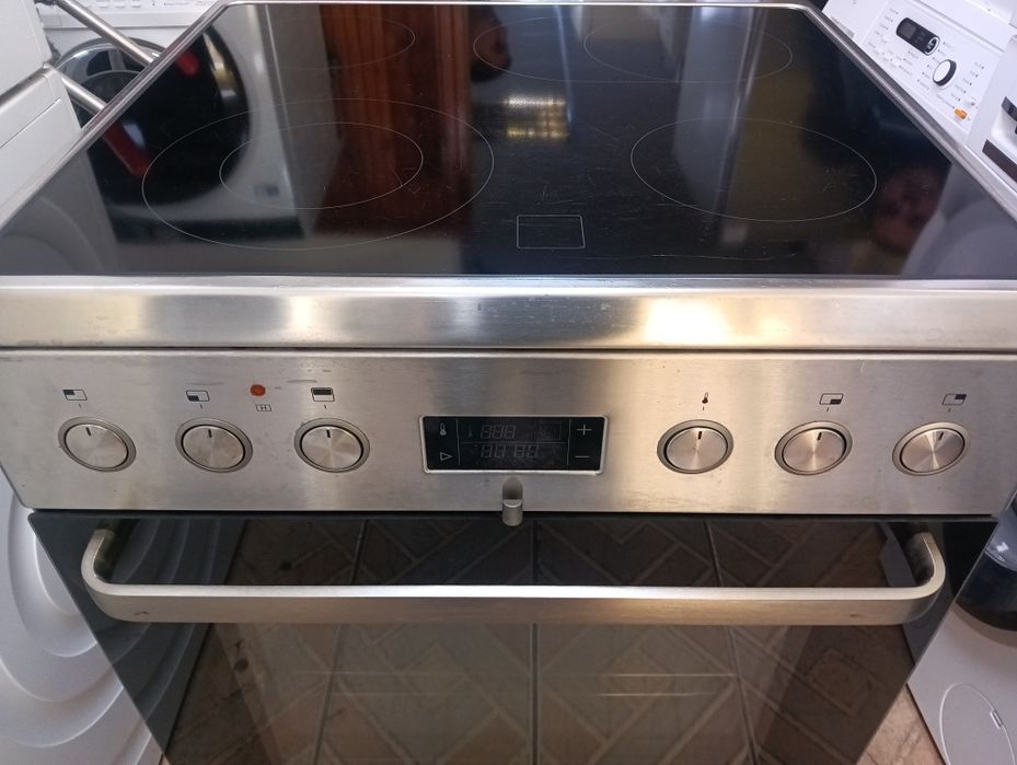 Иноксова свободно стояща печка с керамичен плот Asko 2години гаранция!