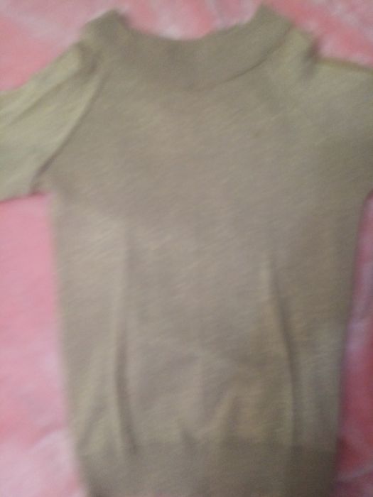 Отдам кофточку бесплатно.