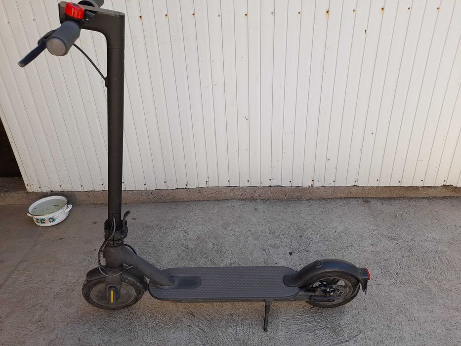 Trotineta electrica si bicicleta