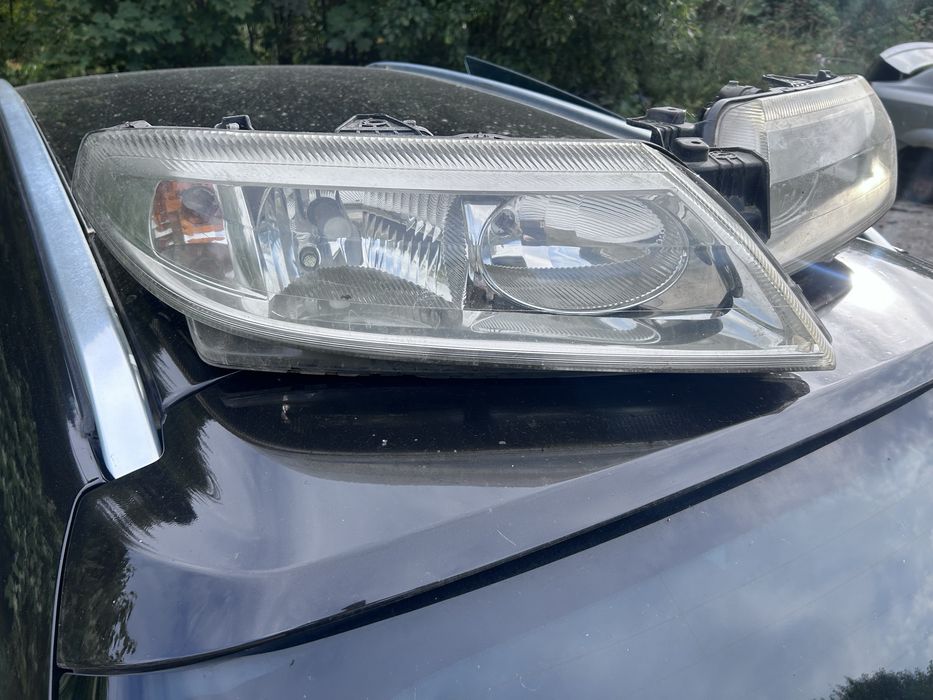 Far renault laguna faruri stanga dreapta