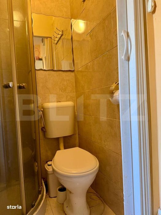 Camera de camin cu baie proprie + loc de parcare