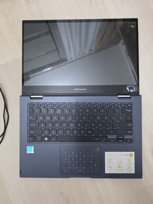 Vând laptop 2-in-1 ASUS VivoBook Flip 14 TP1401KA – touchscreen, rabatabil 360°