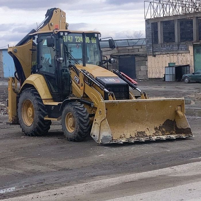 Услуги экскаватора-погрузчика