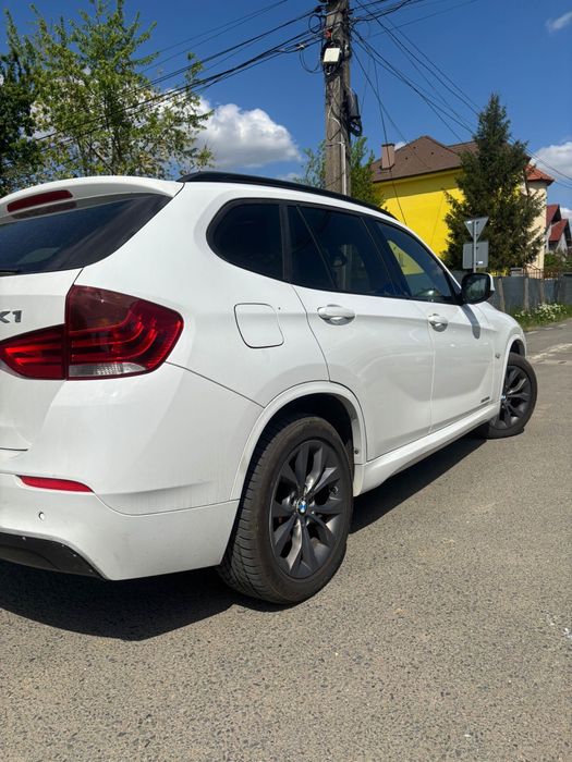 BMW X1 2011 — imagine 5