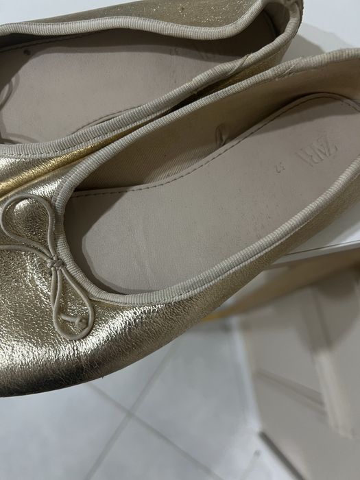 Золотистые балетки Zara