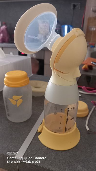Помпа за кърма medela sling flex