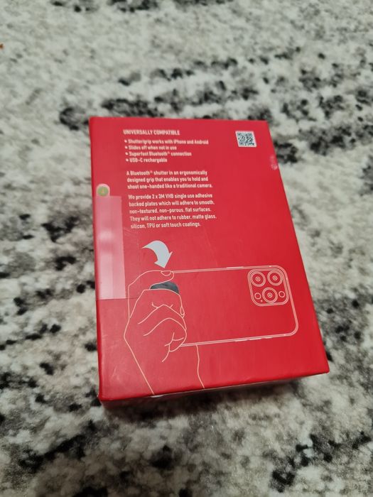 G-Grip - buton pentru poze