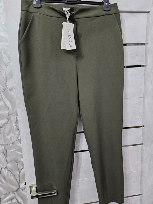 Новые женские брюки 42(+6)