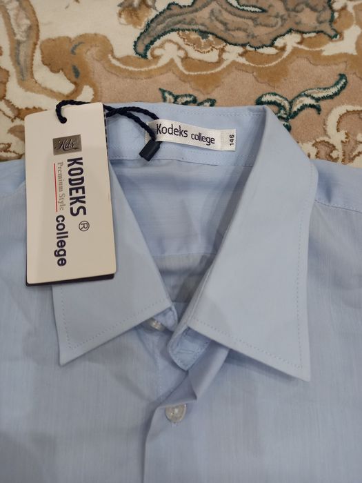 Новые рубашки с америки 65% хлопок голубая одна осталась одна