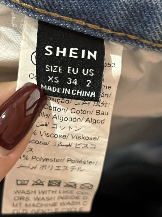 Сини дънки с накъсани елементи в размер Xs