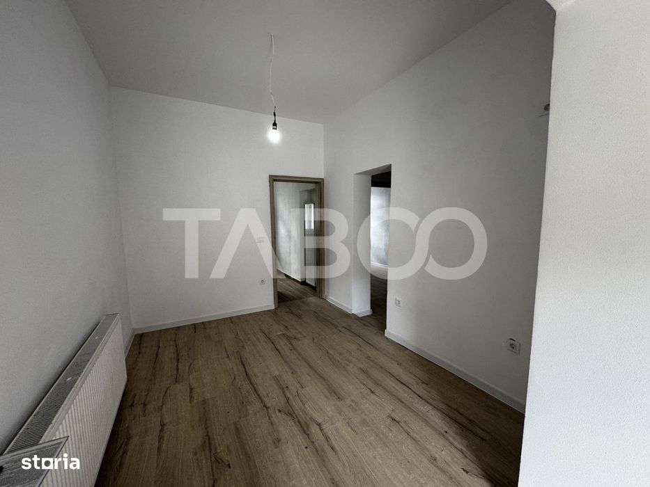 Apartament renovat la casa 3 camere 60 mpu pivnita Piata Cluj Sibiu — fotografia 3