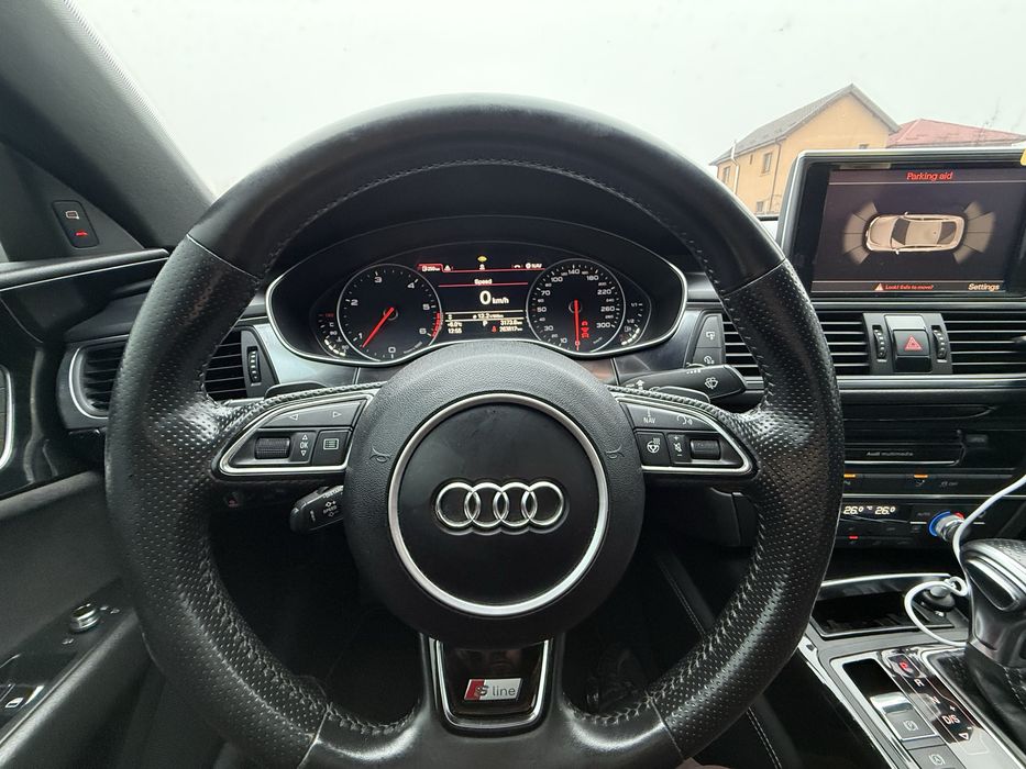 Audi RS7 bi-turbo 313 cp