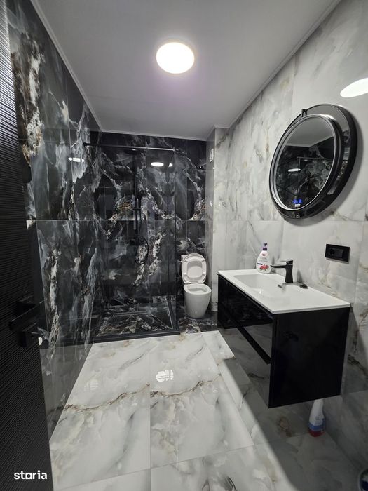 Apartament bloc nou,parcare proprie, mobilat.