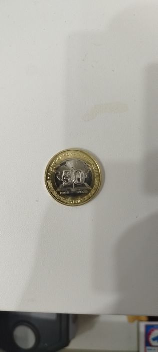 100 тенге монета