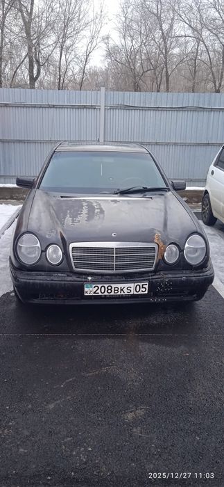 Мерседес 210 бенс