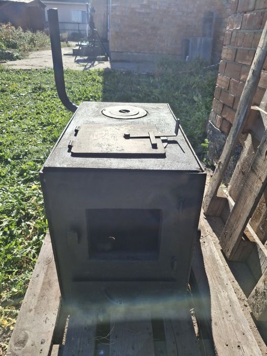 Печка твердоотапливаемая