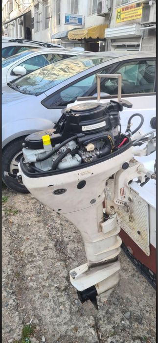 Лодка 4.5 м с двигател Johnson 15 hp + Колесар