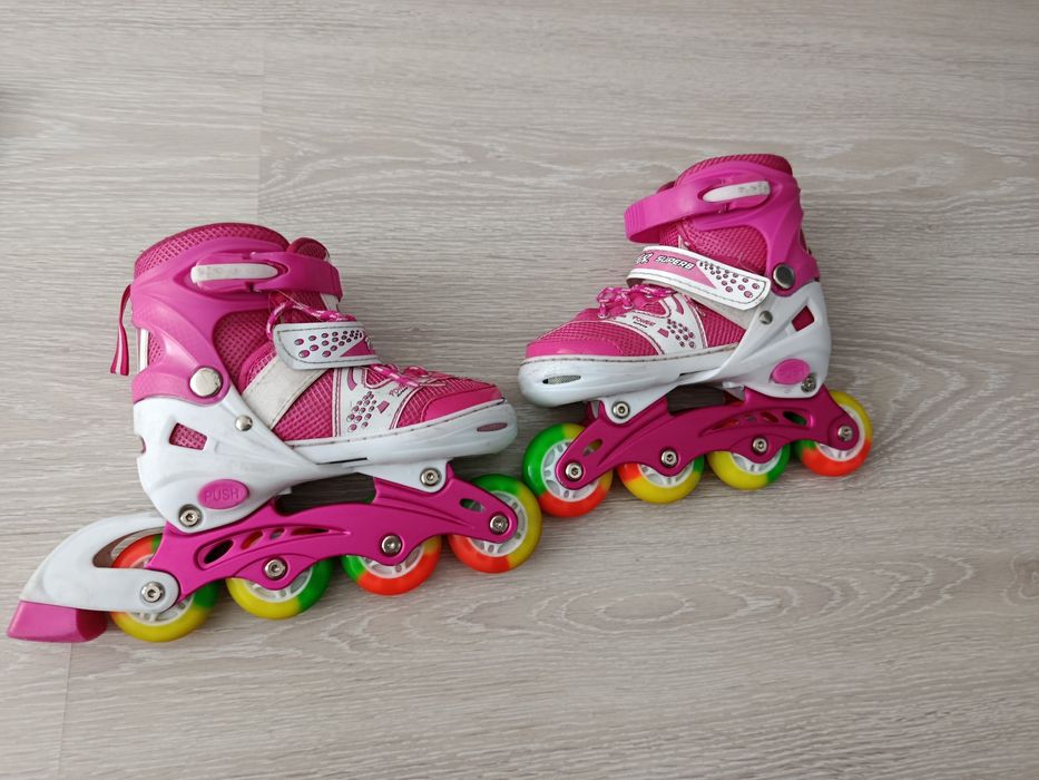 Роликовые коньки