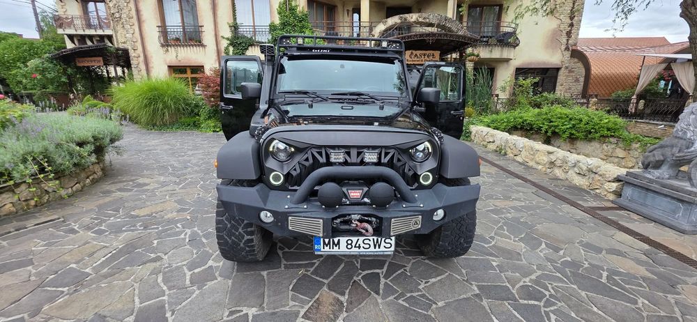Jeep Wrangler Jeep Wrangler 2.8 Diesel 200 cp TOTAL MODIFICAT nu a facut Off-road