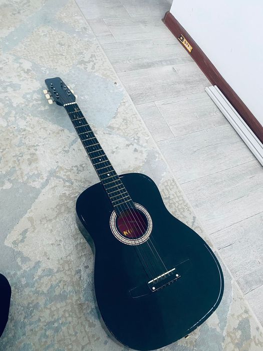 Мошни гитара барлық жеры зың