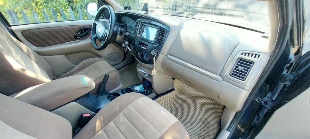 Продам Mazda tribute