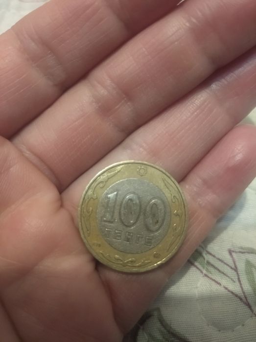 Монет 100 тенге  продам
