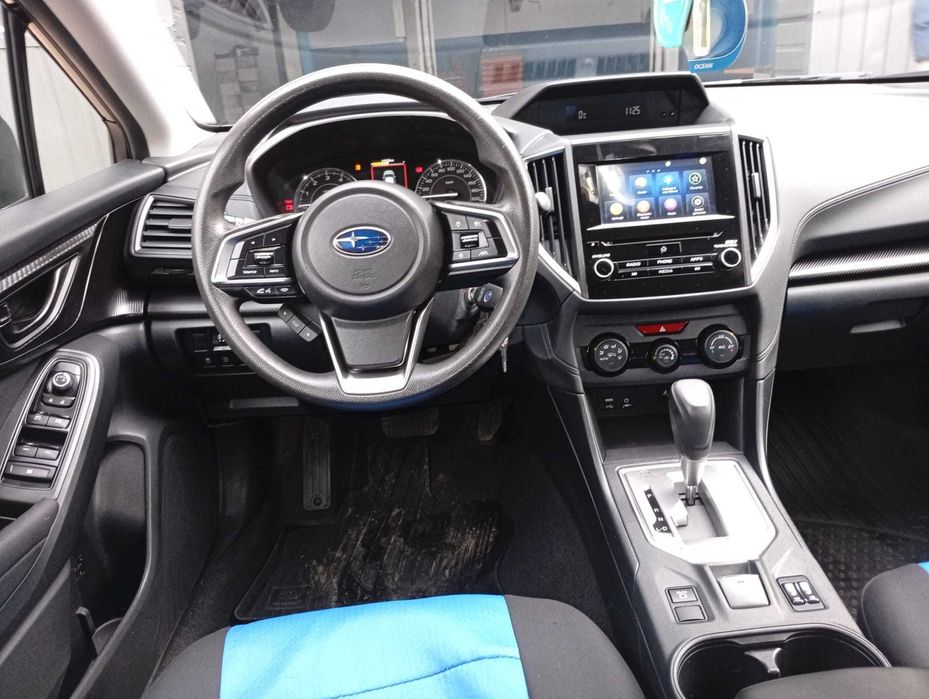 Subaru Impreza 1.6i 5D symetrical AWD Active lineartr. Trend